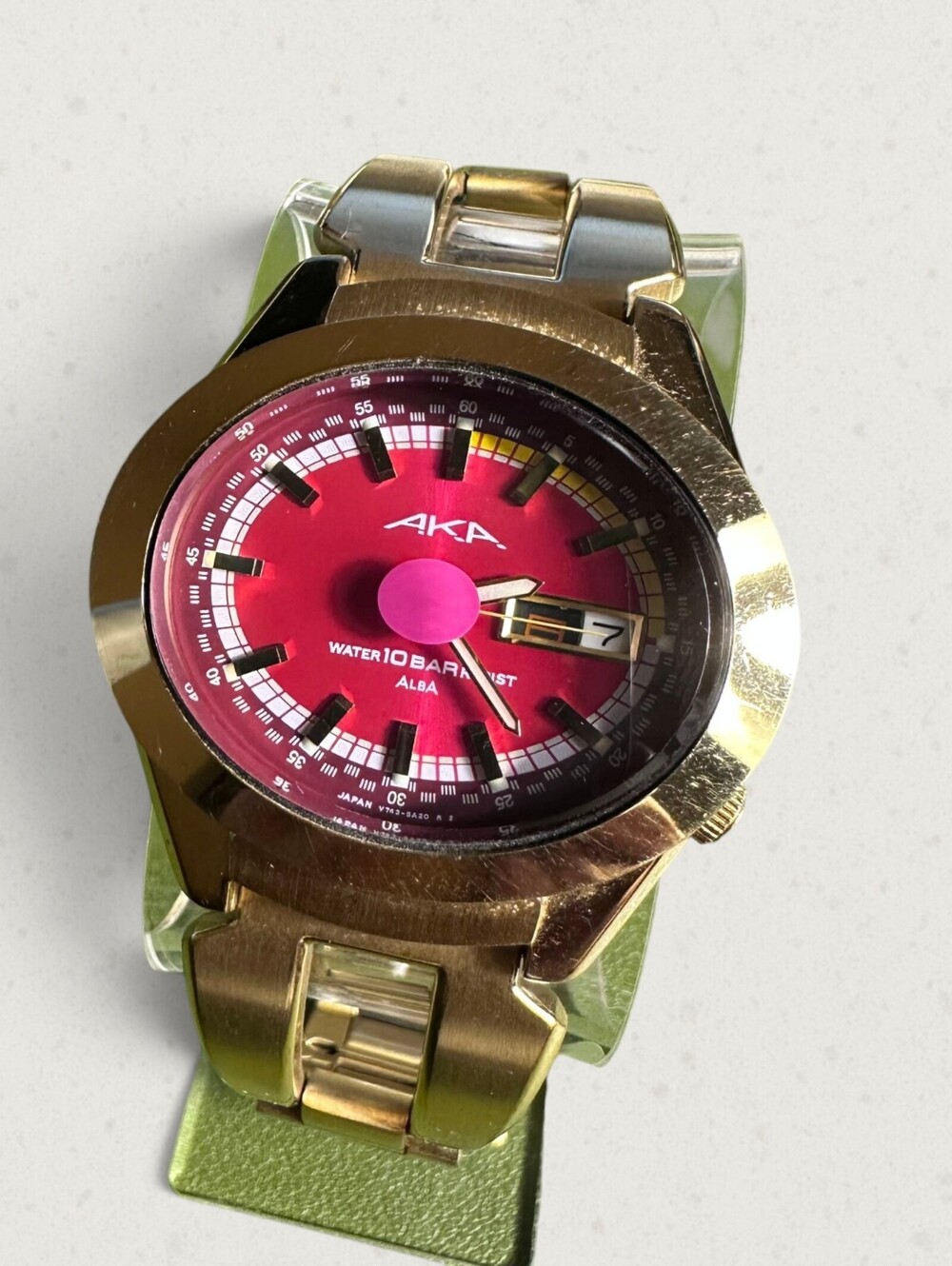 Vintage Seiko Alba AKA Red Face Oval Dial Gold Tone Watch V743-5A10 Y2K